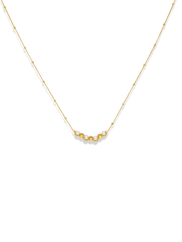 Accent Beaded Choker Necklace in gold with faux pearls, on a white background, front close-up