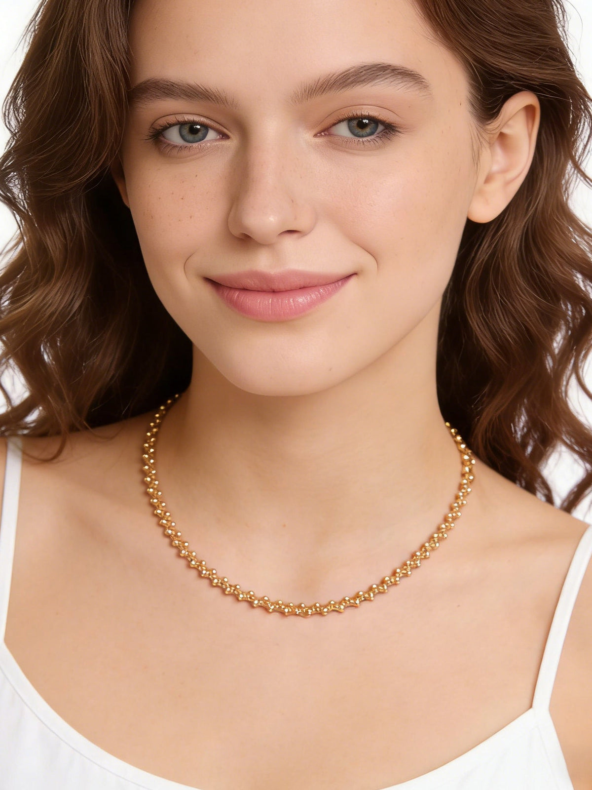 Golden Beaded Choker Necklace in gold, shown on a model smiling, front view