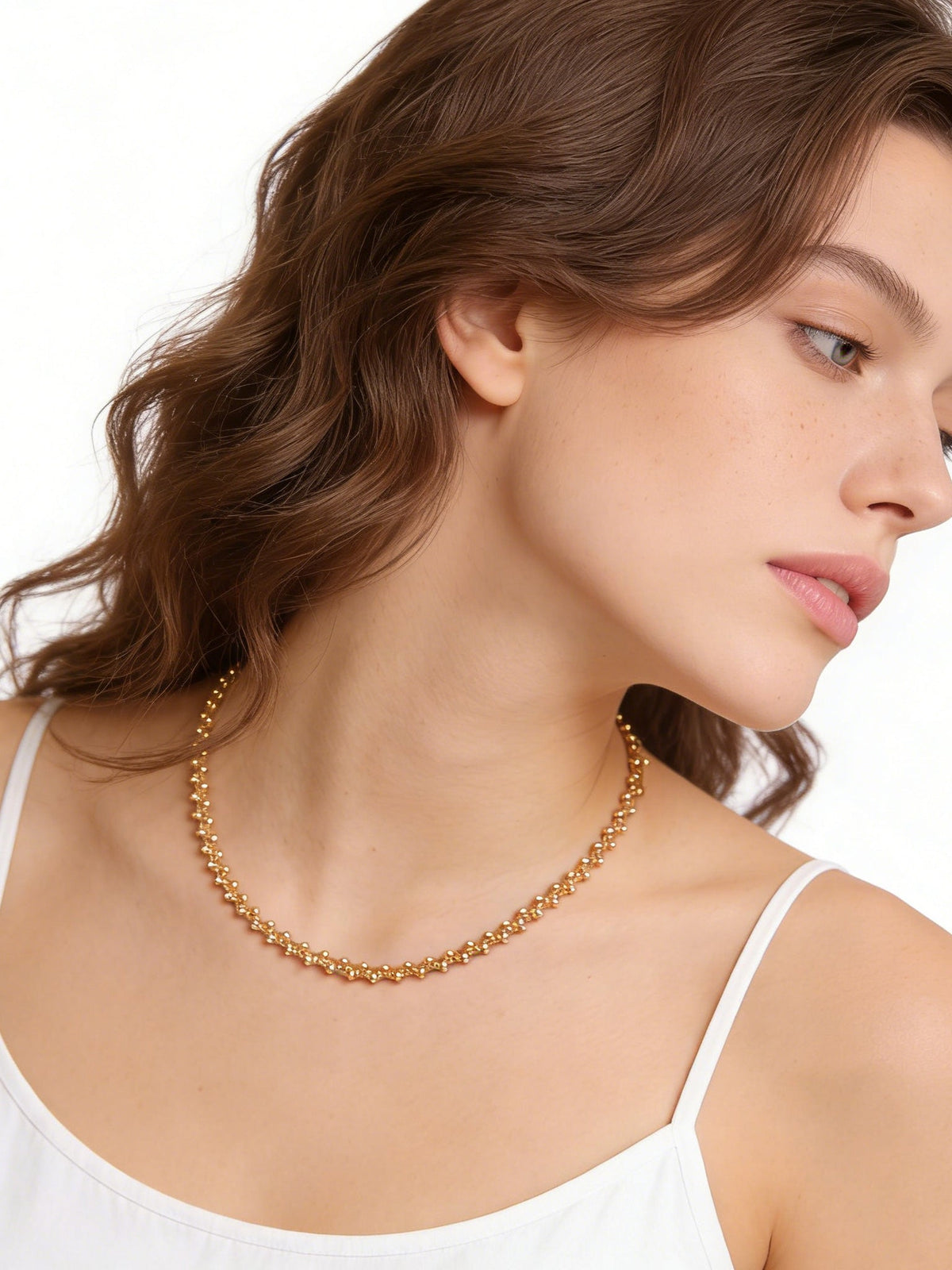 Golden Beaded Choker Necklace in gold, shown on a model, right profile view