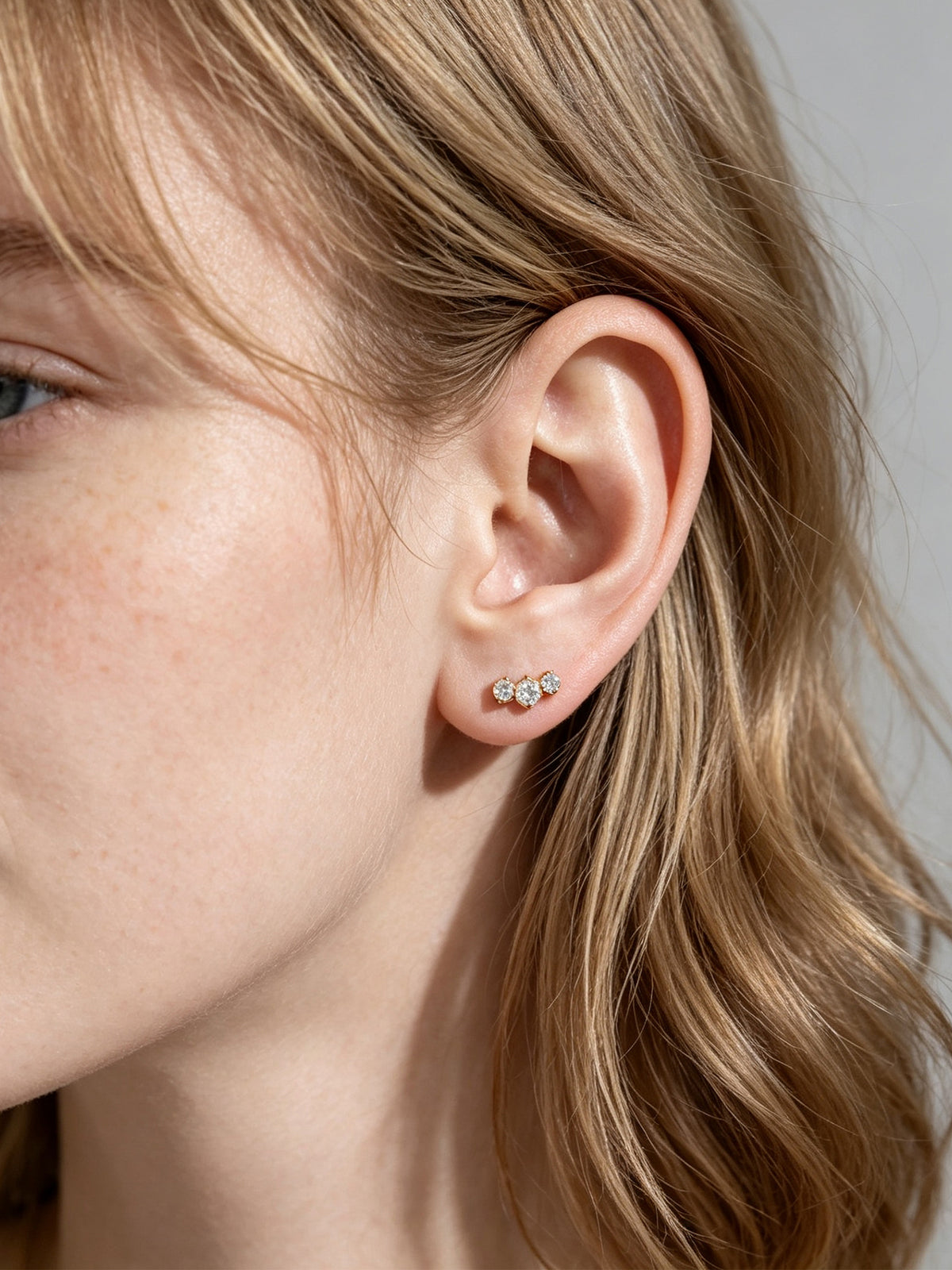 Gradual Triple Crystal Stud Earrings – Image 3