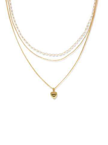 Layered Heart Pendant Necklace in gold with faux pearls, on a white background, full layered front view
