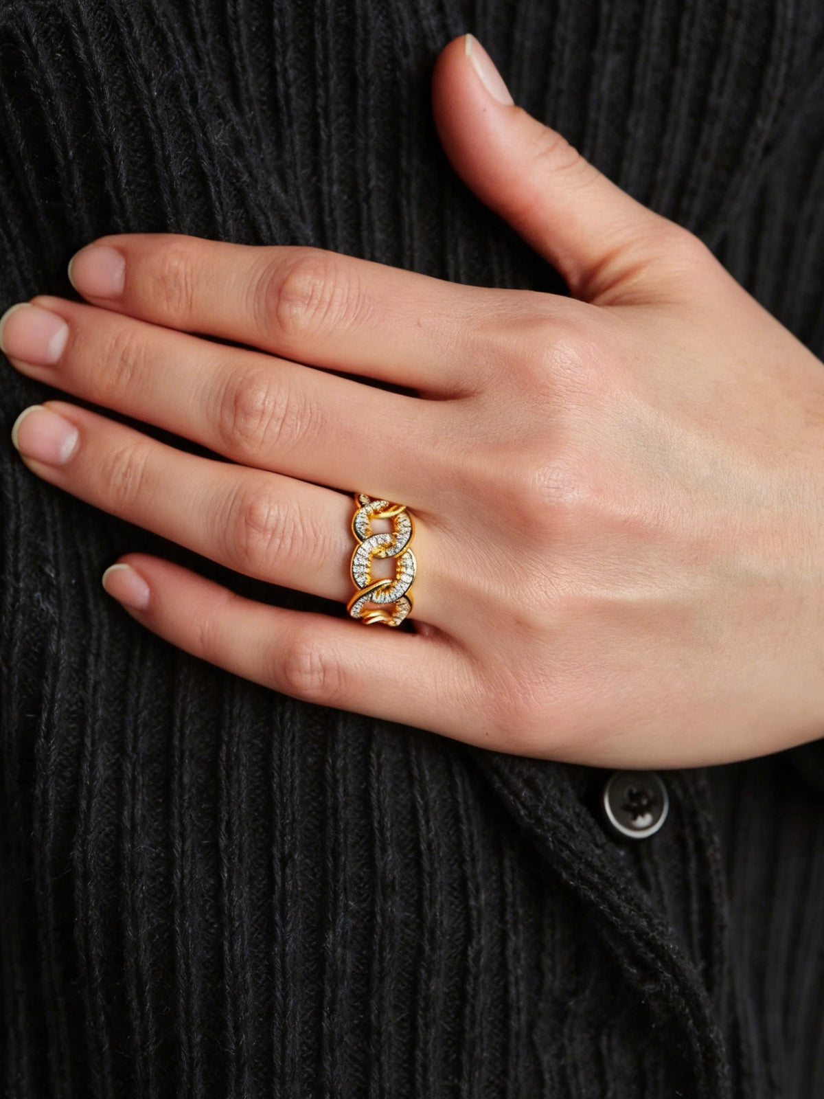 Self-Connection Chain Ring in gold with clear stones, shown on a model, close up