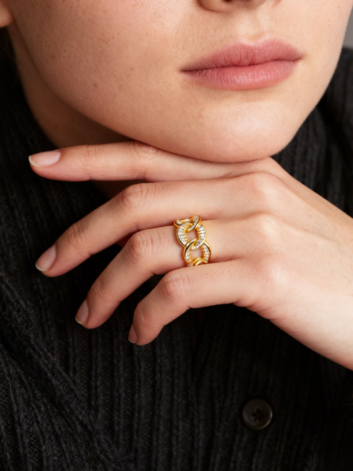 Self-Connection Chain Ring in gold with clear stones, shown on a model, close up