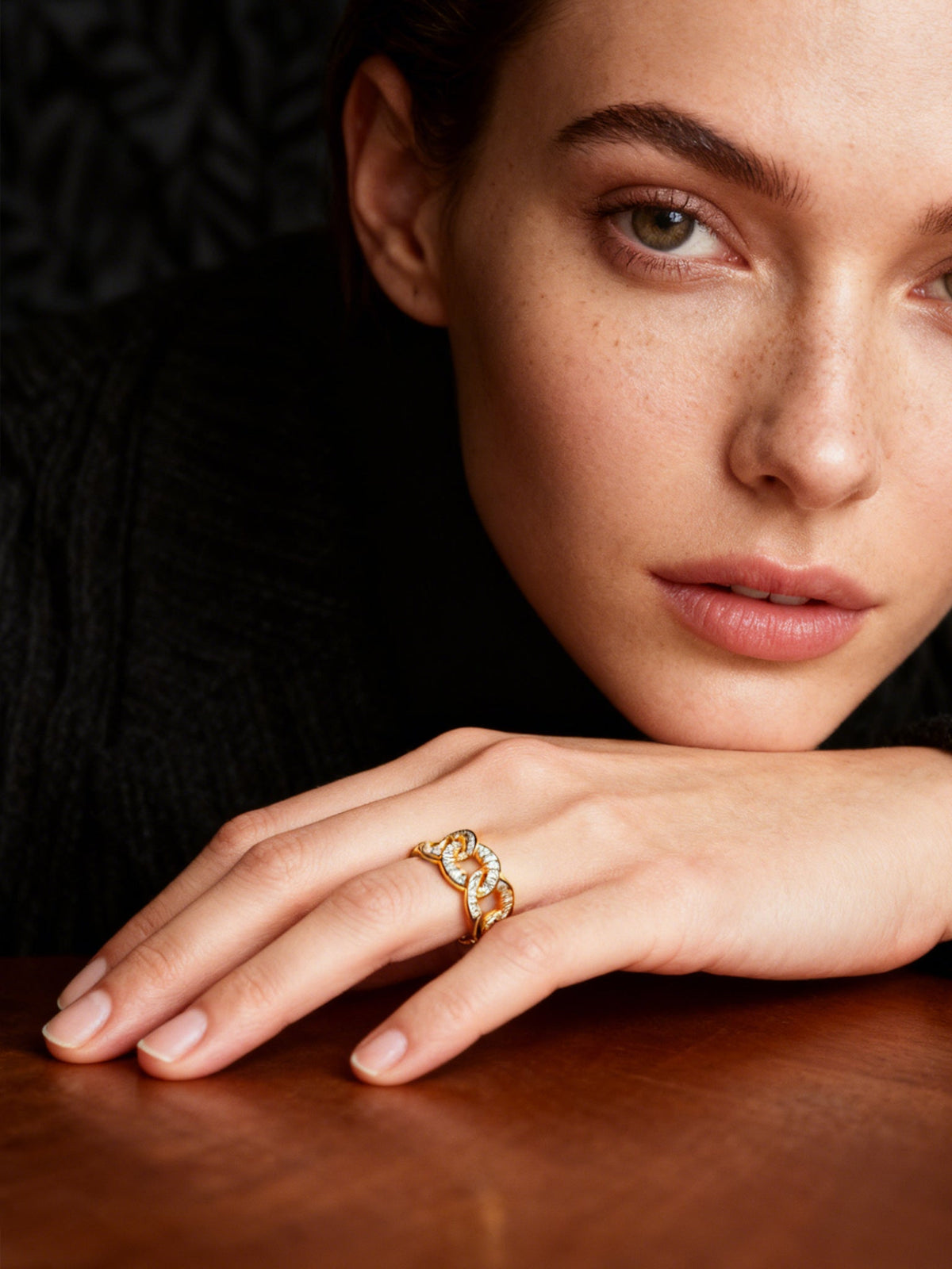 Self-Connection Chain Ring in gold with clear stones, shown on a model, front view