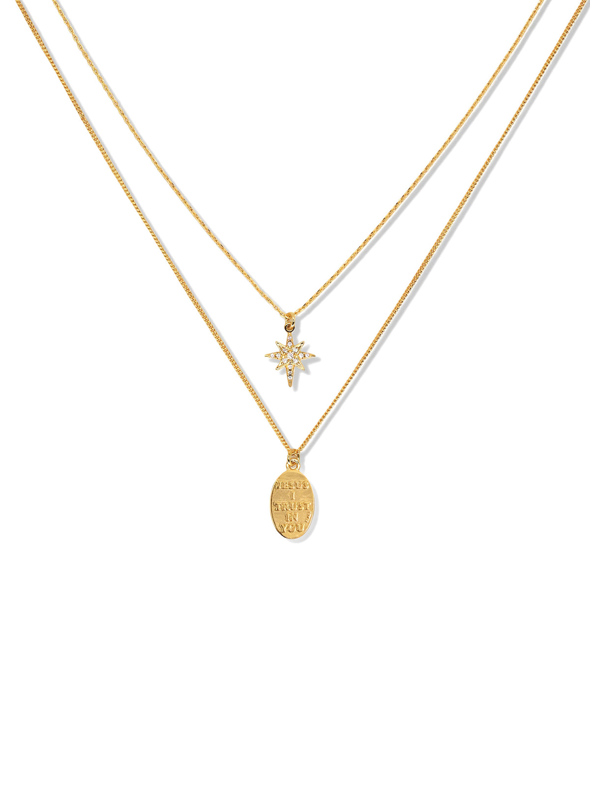 Star and Engraved Layered Necklace in gold, on a white background, pendant close-up